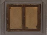 a picture of an old window with a brown frame