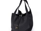 a black leather bag with a zipper on the front