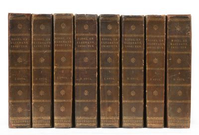 a set of six old books sitting on top of each other