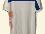 white t - shirt with blue and orange design on the chest