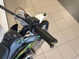 a close up of a motorcycle handlebar on a bike