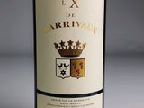 a bottle of wine that is sitting on a table