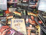 a lot of comic books that are on the table