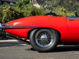 an image of a red sports car parked in a parking lot
