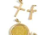 two gold crosses and a gold coin on a white background