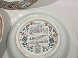 three plates with different designs on them on a table