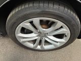 a close up of a tire on a car ' s rim