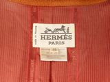 a close up of a label on a dress with a dog on it