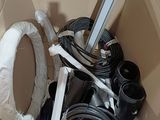 a cardboard box filled with different types of plumbing equipment