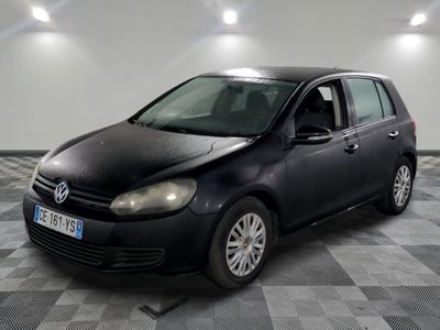 a picture of a black car parked in a garage