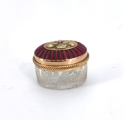 an image of a glass jar with a red lid on a white surface