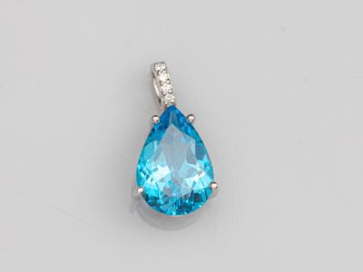 a blue topaz quartz and diamond pendant