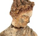 a statue of a woman holding a baby in her arms