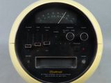 a close up of a yellow meter with a clock on it
