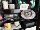 a shelf with various items on it in a store