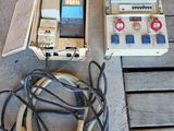 a box that has some wires and a phone in it
