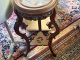 a small table that has a glass top on it
