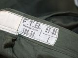 a close up of a military uniform label on the back of a jacket
