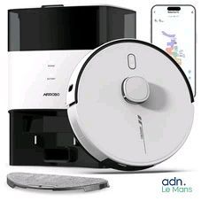 an image of a white and black vacuum cleaner next to a smart phone