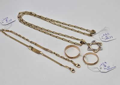 a group of gold jewellery including rings, bracelets and rings