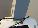 a cell phone sitting on top of a machine