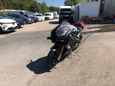 a motorcycle that is parked in a parking lot