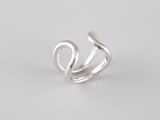 a close up of a silver ring on a white background