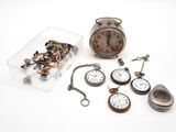 many different types of pocket watches in this case