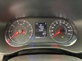 a close up of a car dashboard with a speedometer and gauges
