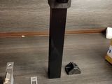 a picture of a piece of metal on a wooden floor