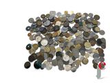 a pile of old coins on a white surface