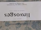 a sign that says sea soars on a bed