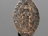 une image représentant une pièce d'or et d'argent sur laquelle figure une femme tenant un enfant dans ses bras
