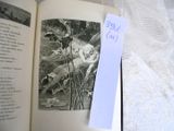 an open book with a picture of a man and a dog on it
