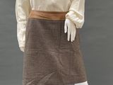 an image of a mannequin wearing a skirt and blouse