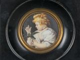 painting of a young girl holding a flower in a black frame