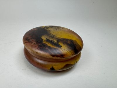 a picture of a wooden box on a white surface