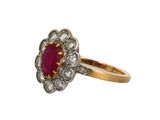 an antique ruby and diamond cluster ring