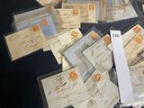 a pile of old envelopes sitting on top of a table