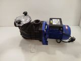 a blue and black water pump on a white table