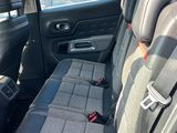 the back seats of a car are empty in the sun