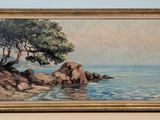 une peinture à l'huile représentant un arbre sur un rivage rocheux au bord de l'océan