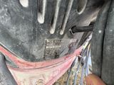 a close up of a motorcycle tire with a sticker on it