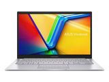 a white laptop with a colorful screen on a white background