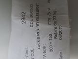 a receipt on the counter of a restaurant with a price tag