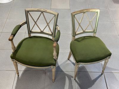 two chairs that are sitting next to each other on the floor