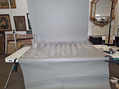a table with a bunch of empty wine glasses on it