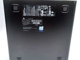 the back of a laptop with a black back panel and a white back panel