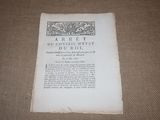 an old book sitting on a table with a black and white picture
