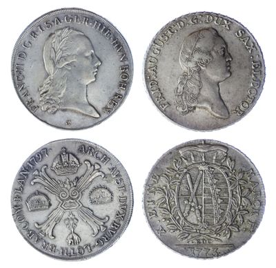 four different types of silver coins on a white background
